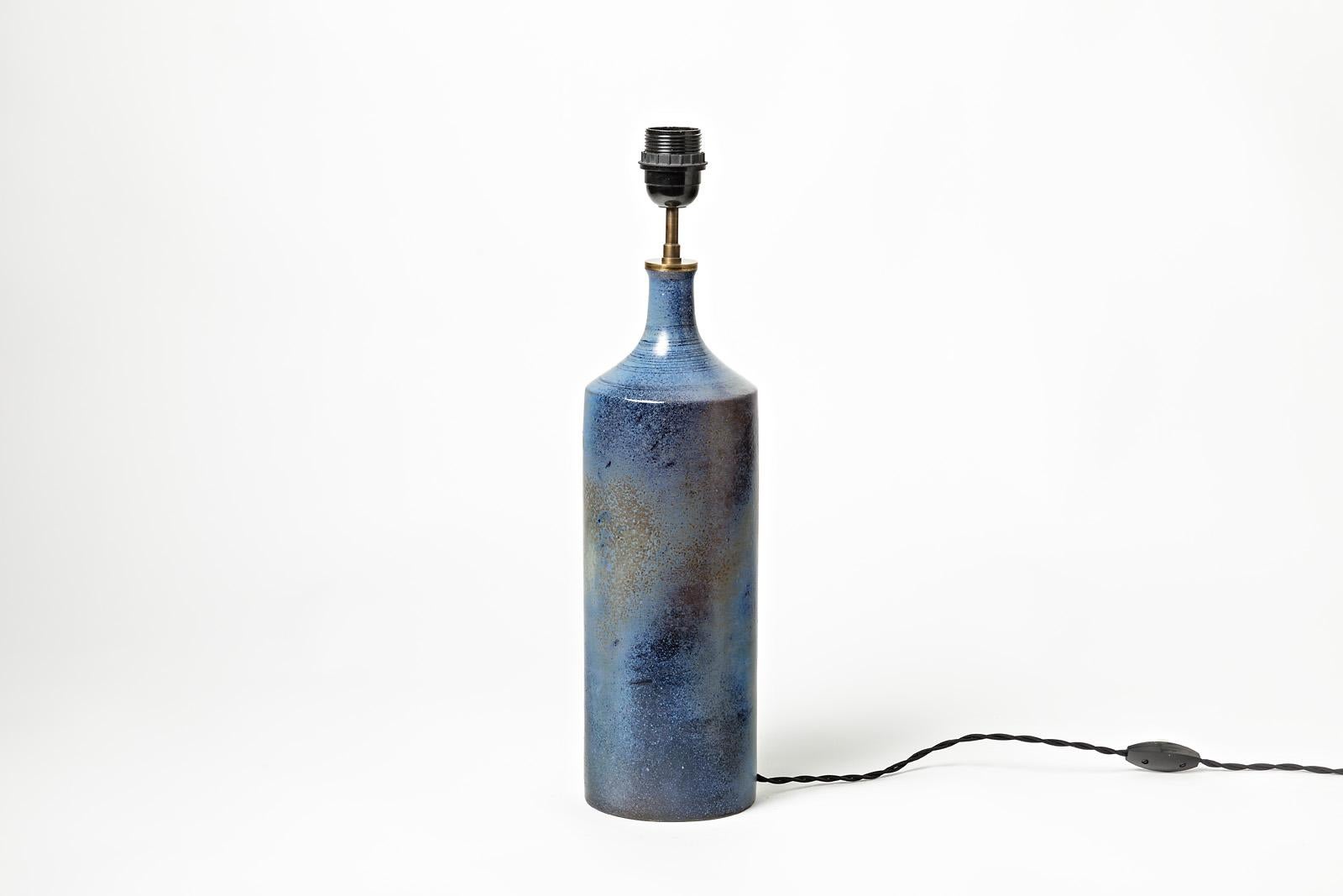 A ceramic table lamp with blue, grey glazes decoration.
Perfect original conditions.
Signed under the base 
