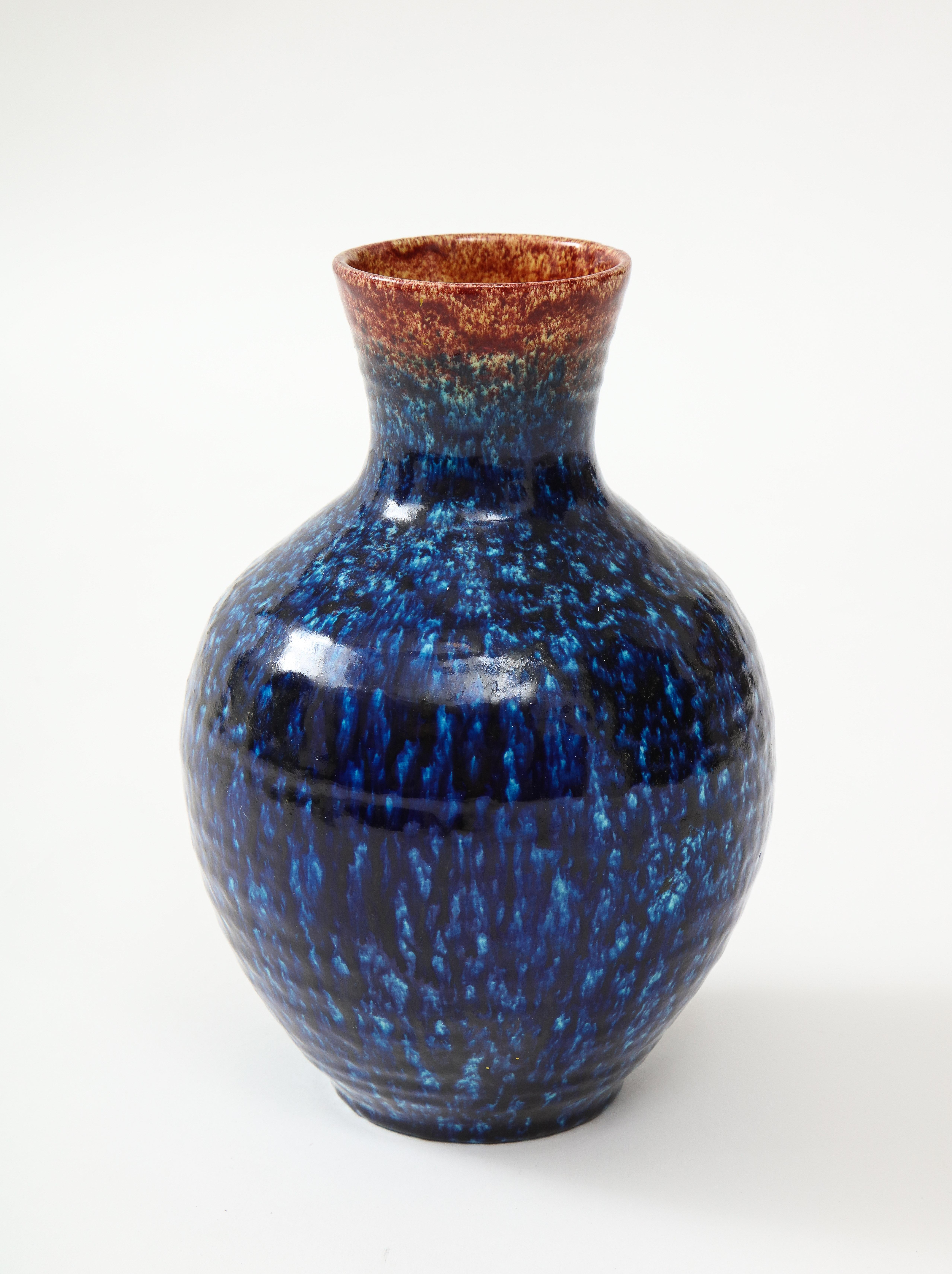 A stunning vase made by Accolay Pottery, France, ca. 1950.