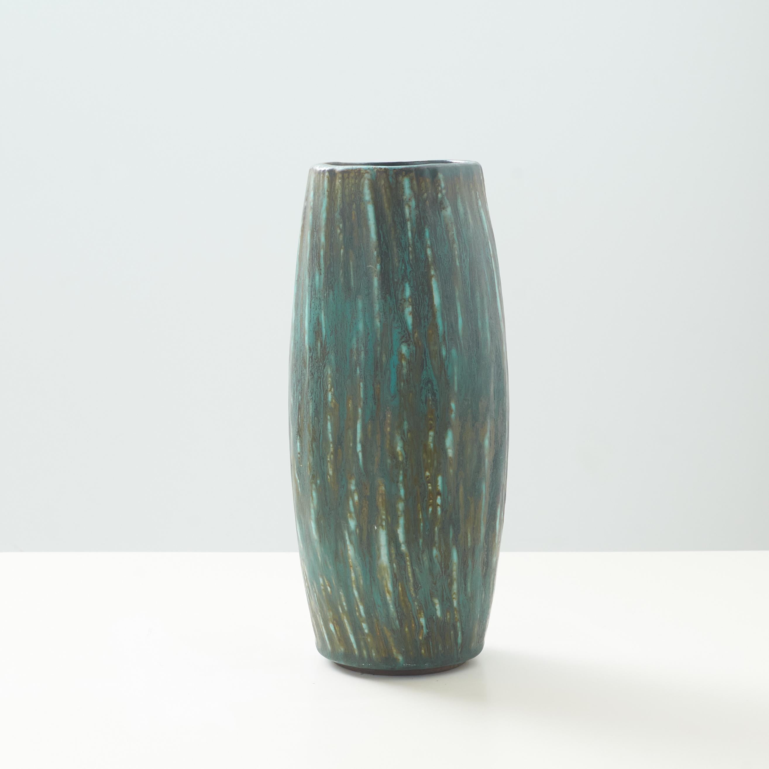 A Gunnar Nylund ceramic vase with a mottled glaze. Incised with maker's mark and designer's initials 