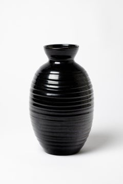 A ceramic vase with black glaze decoration by Accolay potters, cica 1960- 1970