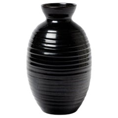 A ceramic vase with black glaze decoration by Accolay potters, cica 1960- 1970