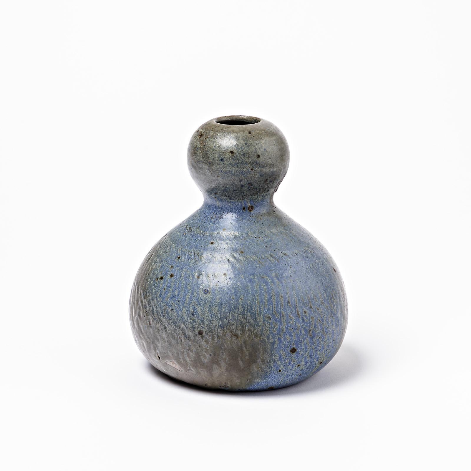 Vase aus Keramik mit blauer und brauner Glasur, ein Werk von Théo Perrot.
Perfekter Originalzustand.
Unter dem Sockel signiert 