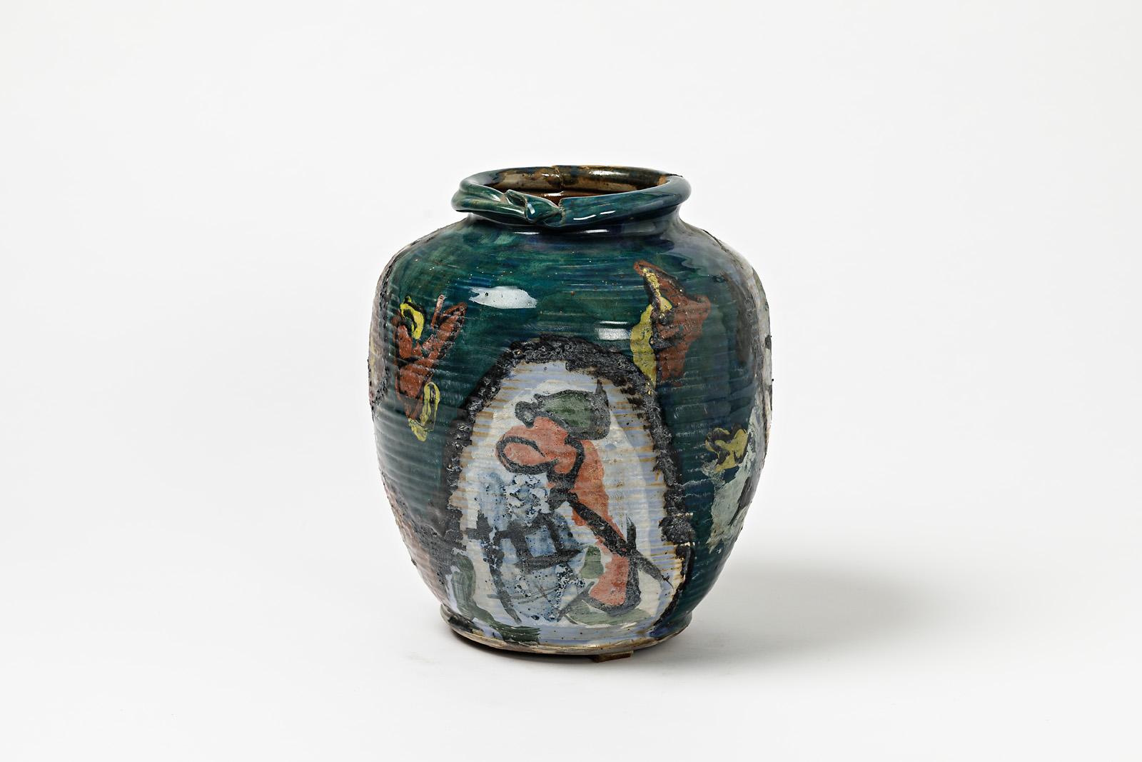 A ceramic vase with glazes decoration by Michel Lanos (1926-2005).
Perfect original decorations.
Artist monogram under the base.
circa 1990.
Unique piece.