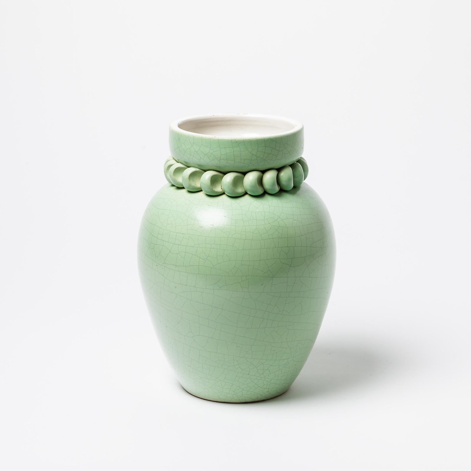 A ceramic vase by Pol Chambost with green and white glaze decoration.
Perfect original conditions.
Signed under the base 