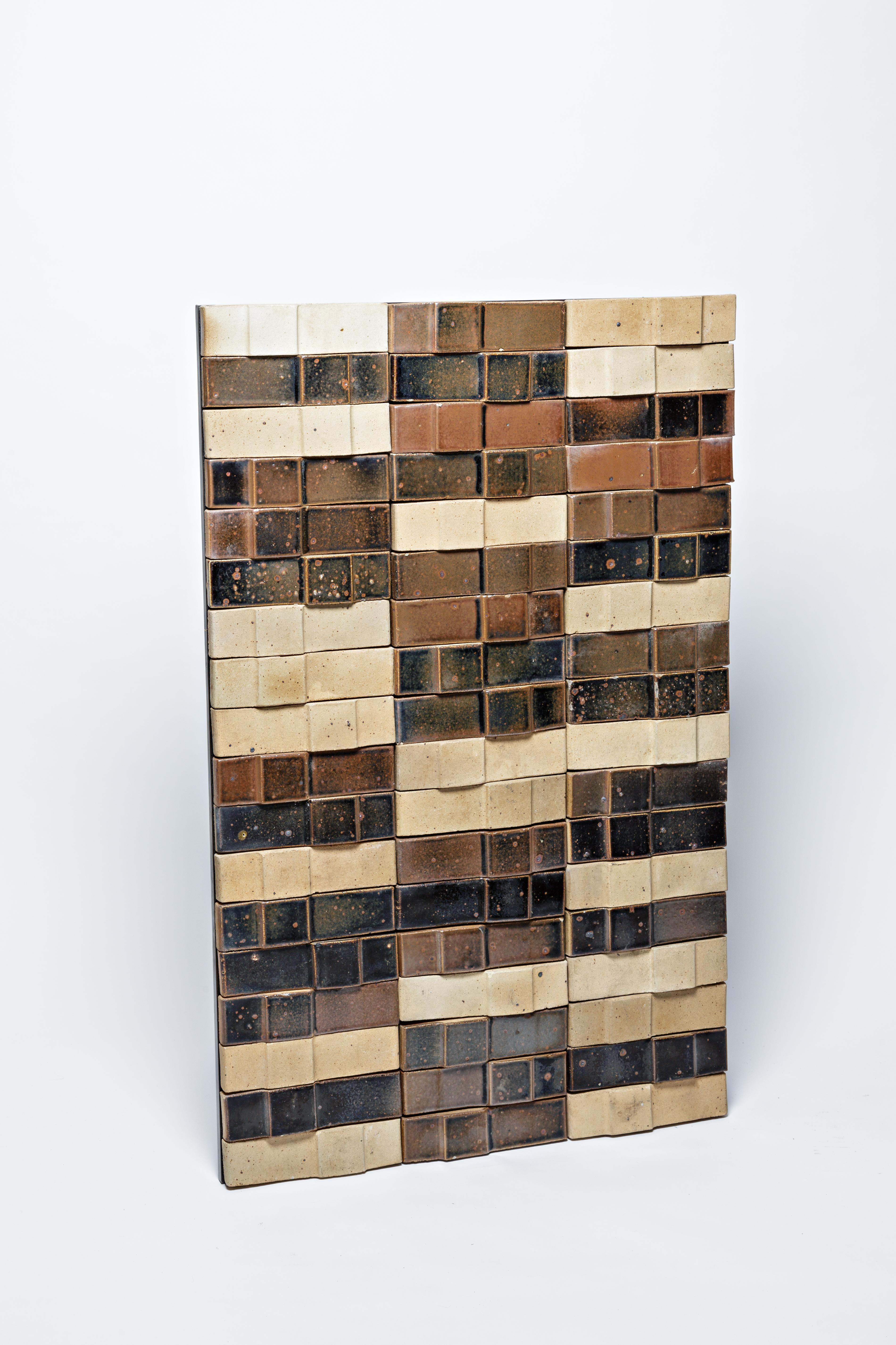 A ceramic wall panel by Pierre Digan, to La Borne, circa 1970-1975.
The base is in wood.
Very good original conditions.
A set of 9 similar panels is available.
 