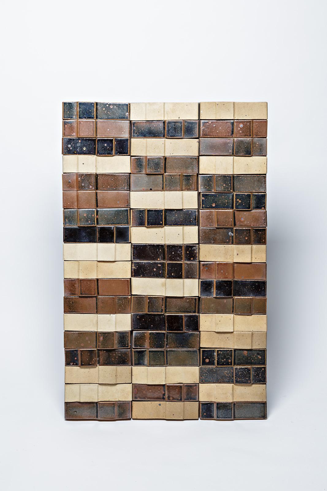 A ceramic wall panel by Pierre Digan, to La Borne, circa 1970-1975.
The base is in wood.
Very good original conditions.
A set of 9 similar panels is available.