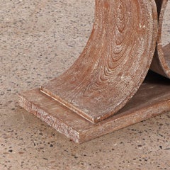 A cerused oak console table in the manner of Karl Springer.