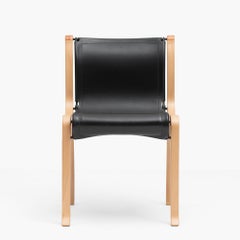 A Chair by Cristian Valdes 1977, laminated wood & leather, Black