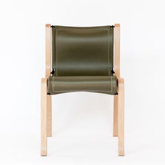 A Chair by Cristian Valdes 1977, laminated wood & leather, Green