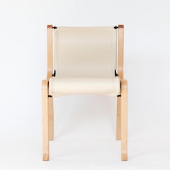 A Chair by Cristian Valdes 1977, laminated wood & leather, Ivory White