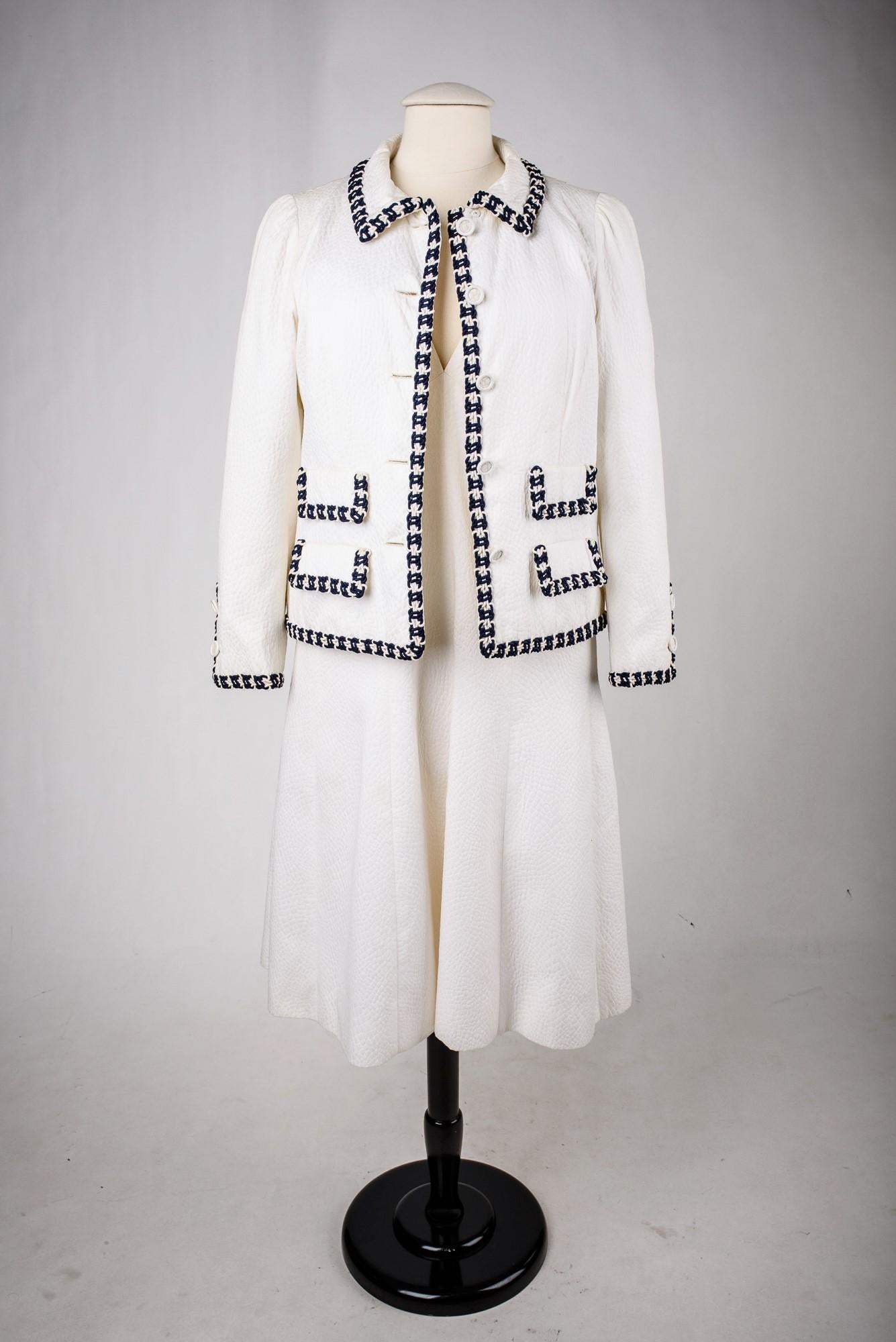 A Chanel Couture white cotton Set numbered 59989/59990 Circa 1970 6