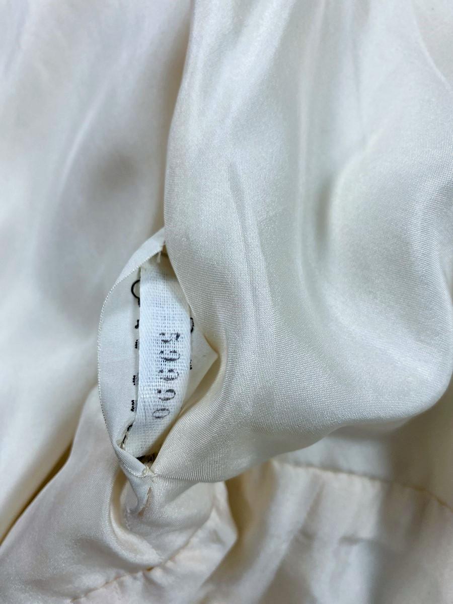 A Chanel Couture white cotton Set numbered 59989/59990 Circa 1970 13