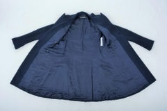 A Chanel Haute Couture Evening Lamé Pyjamas and Woollen Coat Circa Numbered 1980