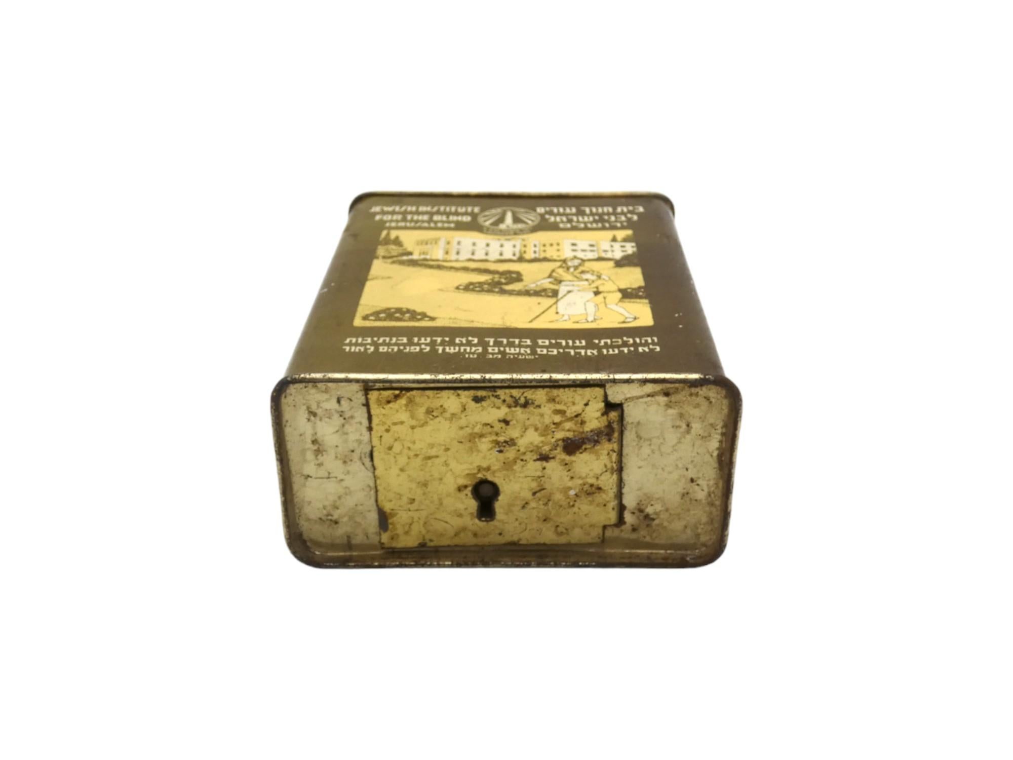 A charity container for the Jewish Institute for the Blind by Alfred Saltzman from Jerusalem in 1930 reflects the efforts to support education and welfare for visually impaired individuals in the early 20th century.

The Jewish Institute for the