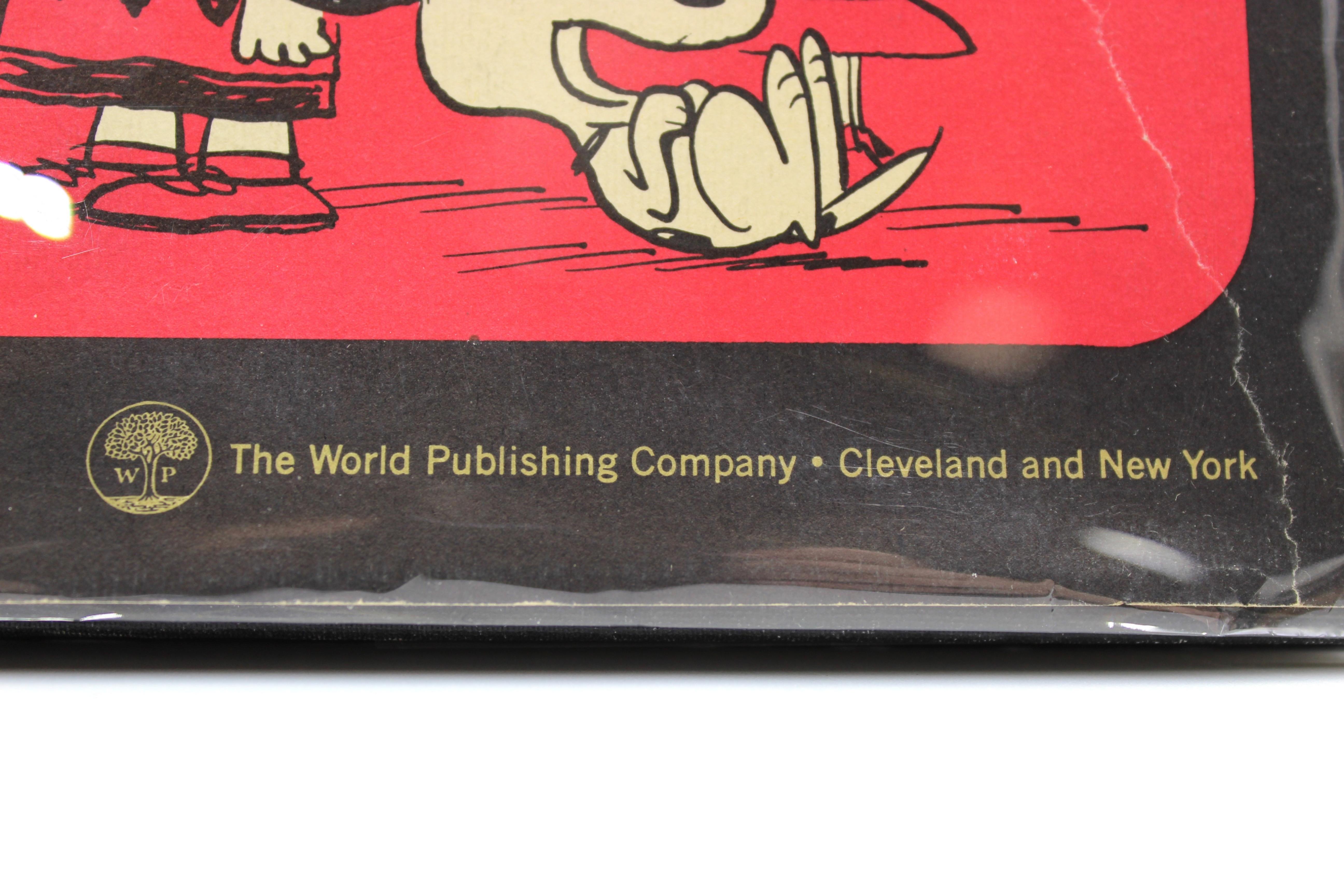Schulz, Charles. A Charlie Brown Christmas. Cleveland and New York: The World Publishing Company, 1965. First edition, first printing. Original hardcover illustrated boards, with later dust jacket. 
Presented is a first edition, first printing of A