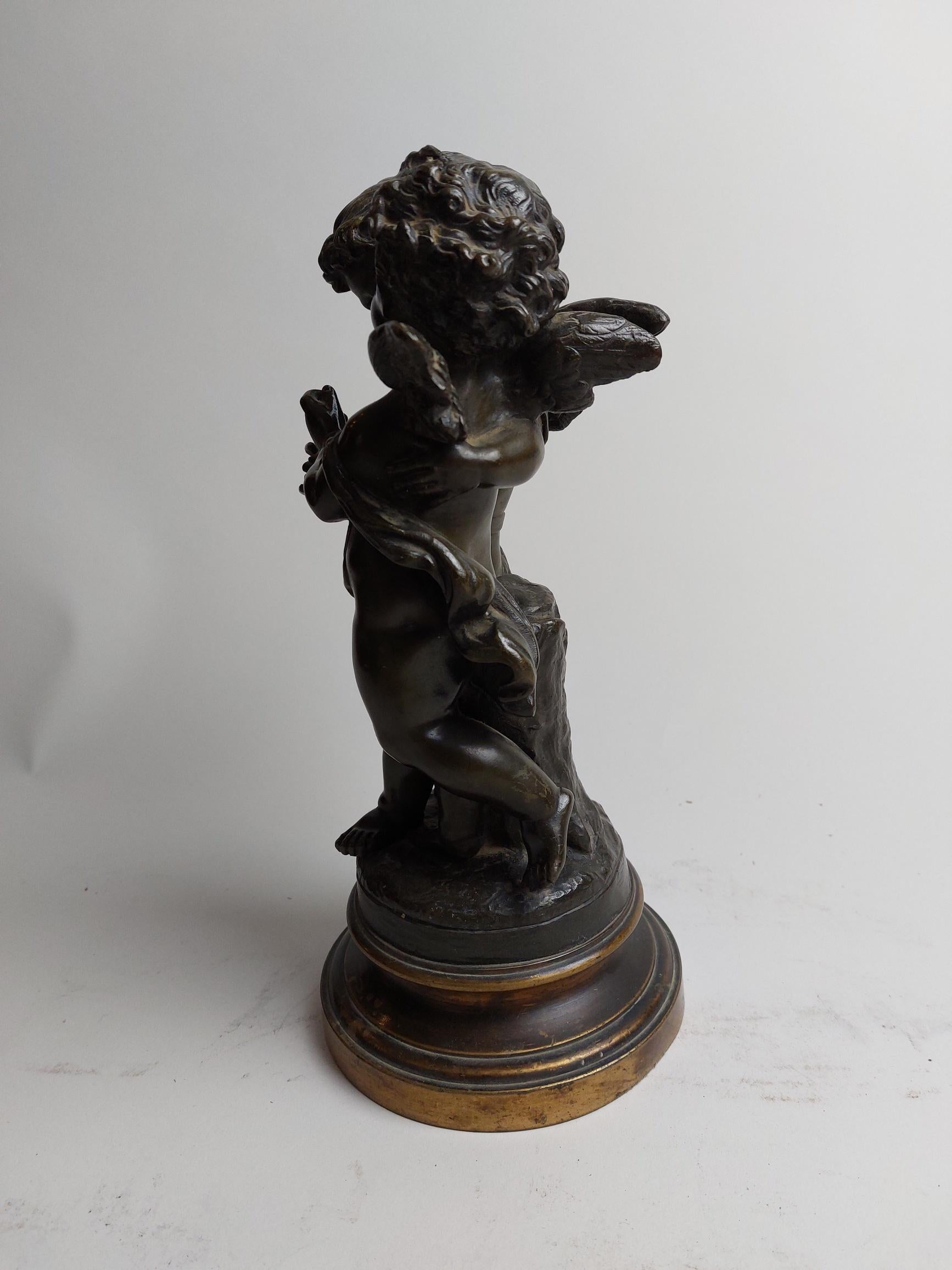 A charming 19th century bronze of boy and girl winged cherubs (putti) embracing each other as they walk along deep in conversation. On a brass base.
Signed Bulio.