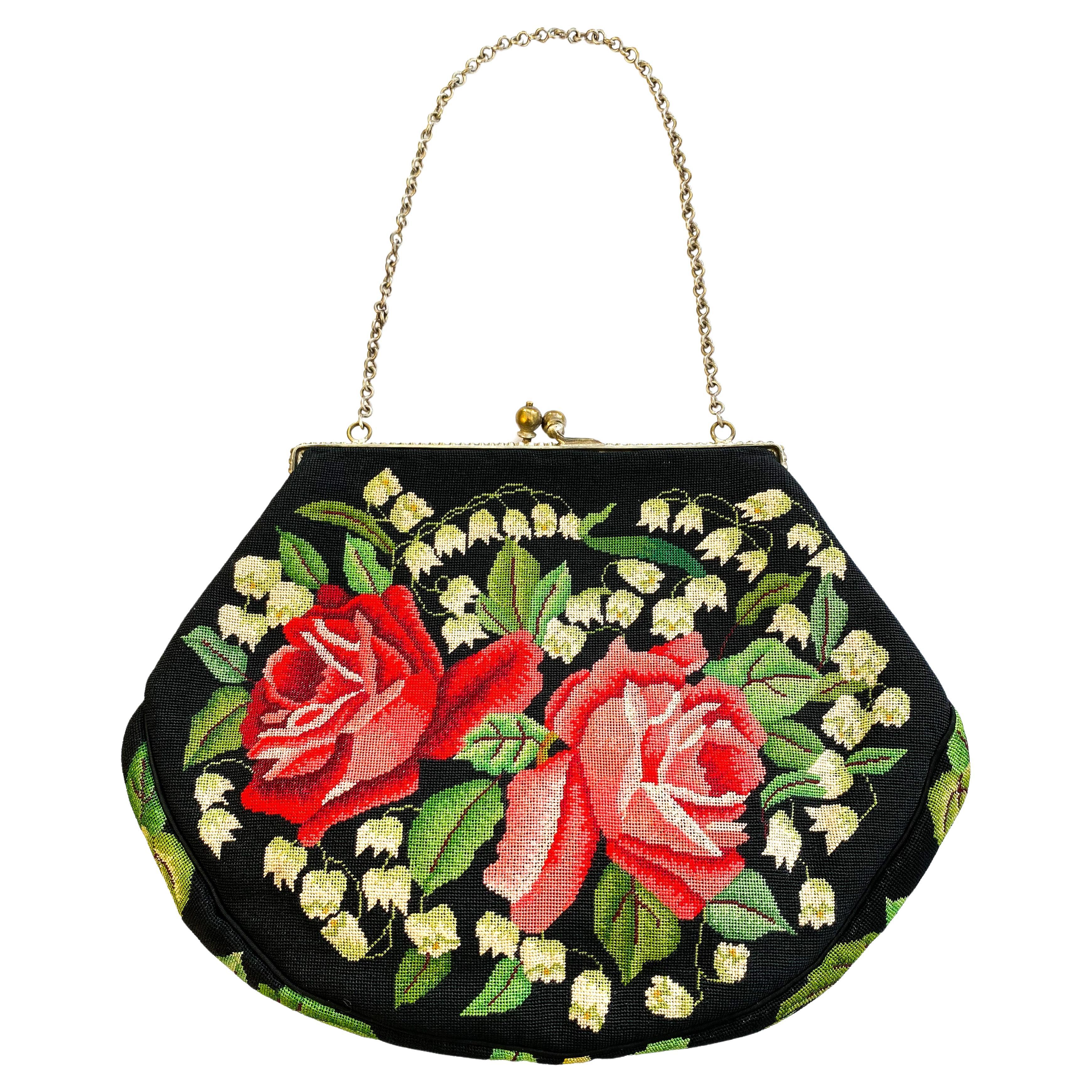 A charming fine petitpoint handbag with lily of the valley motif, France 1930s