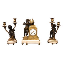 A Charming French Bronze & Ormolu Cherub Clock Garniture