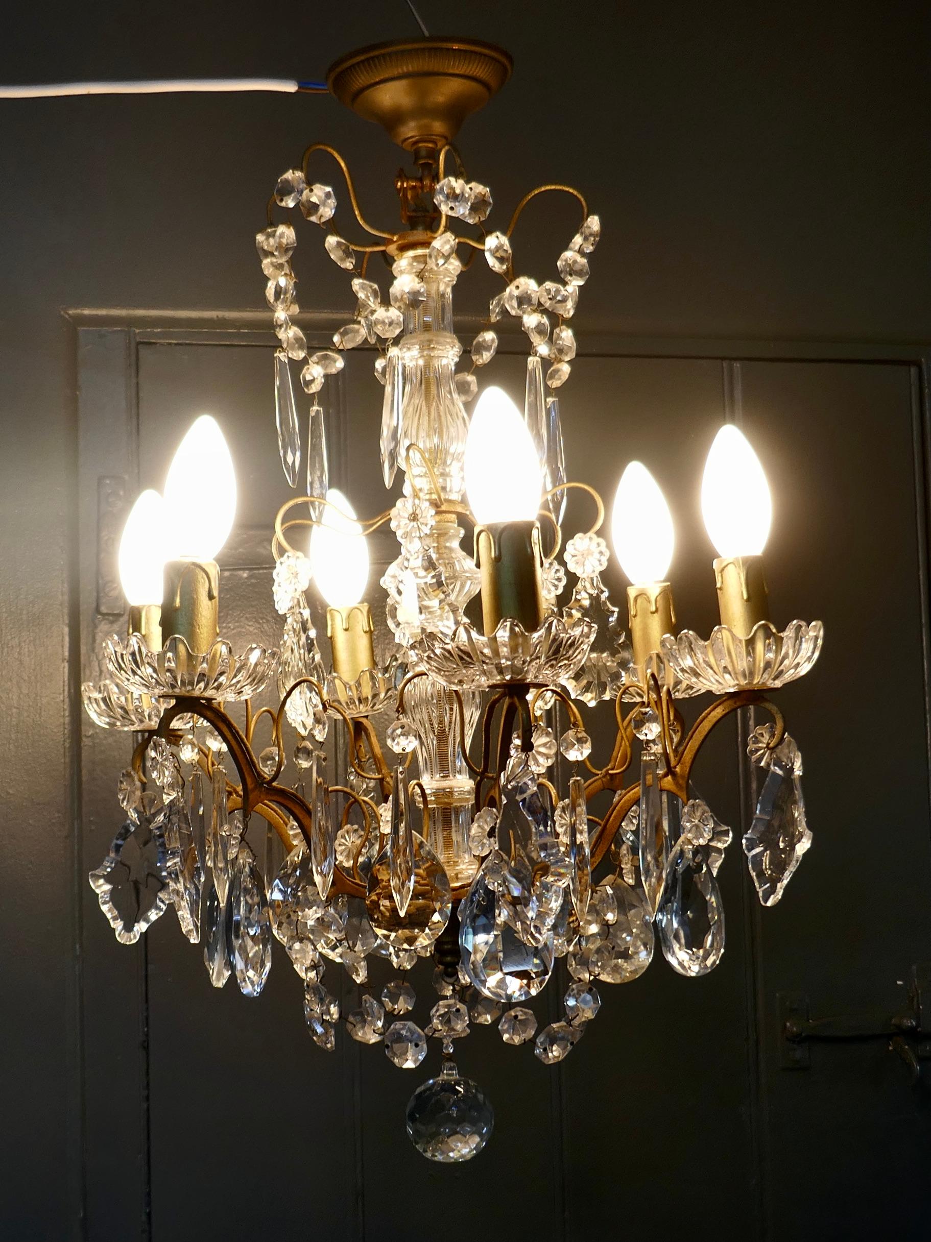 French Provincial Charming French Crystal 6 Branch Brass Chandelier For Sale