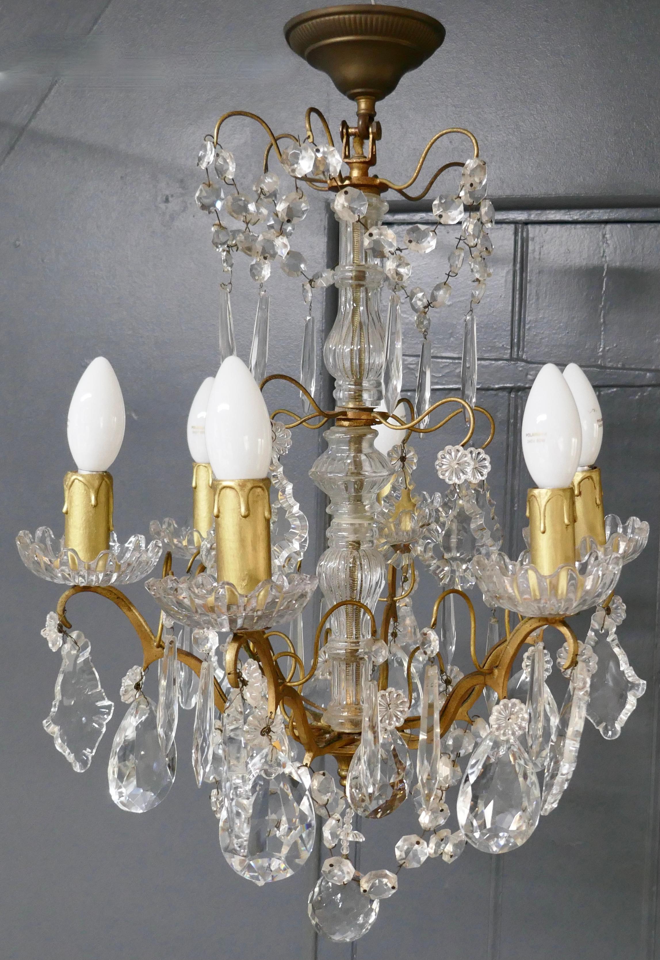 20th Century Charming French Crystal 6 Branch Brass Chandelier For Sale