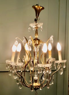 A Charming French Crystal and Brass Chandelier