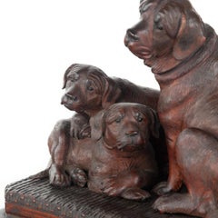 A charming late 19th century Black Forest carved limewood (linden wood) group