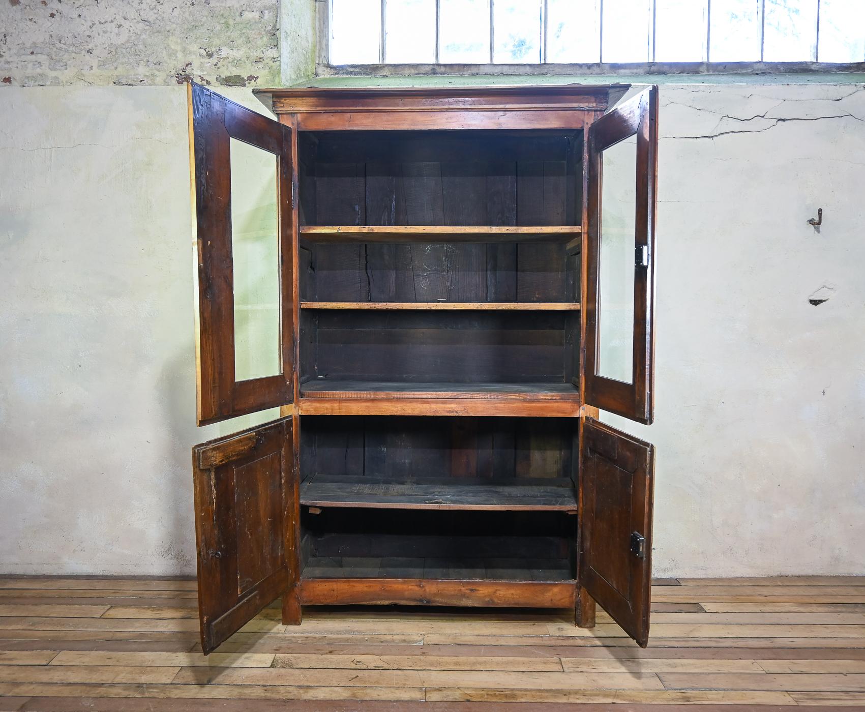 A Charming Mid 19th Century French Cherrywood Glazed Cabinet Bookcase For Sale 8