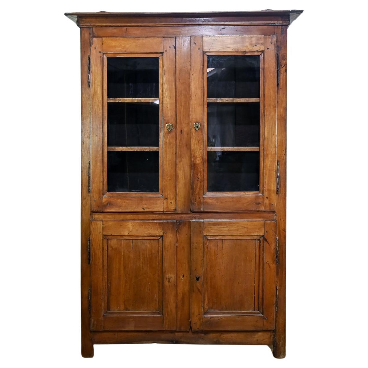 A Charming Mid 19th Century French Cherrywood Glazed Cabinet Bookcase For Sale