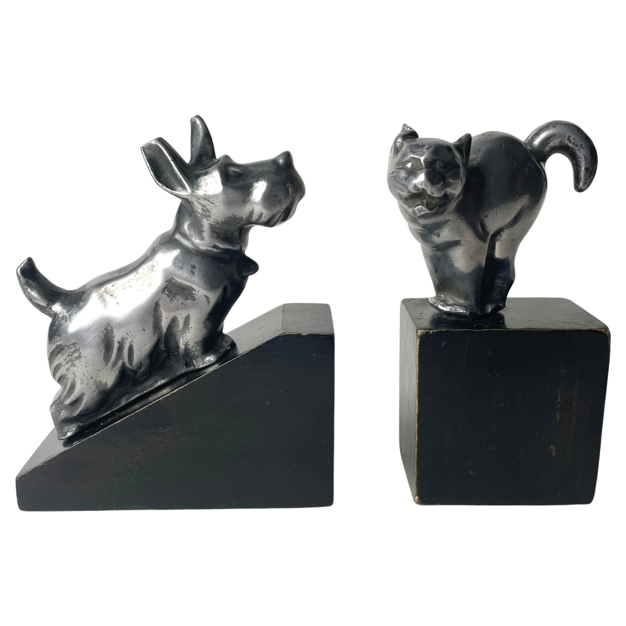 A charming pair of Art Deco Bookends with a dog and a cat from the 1920s-1930s