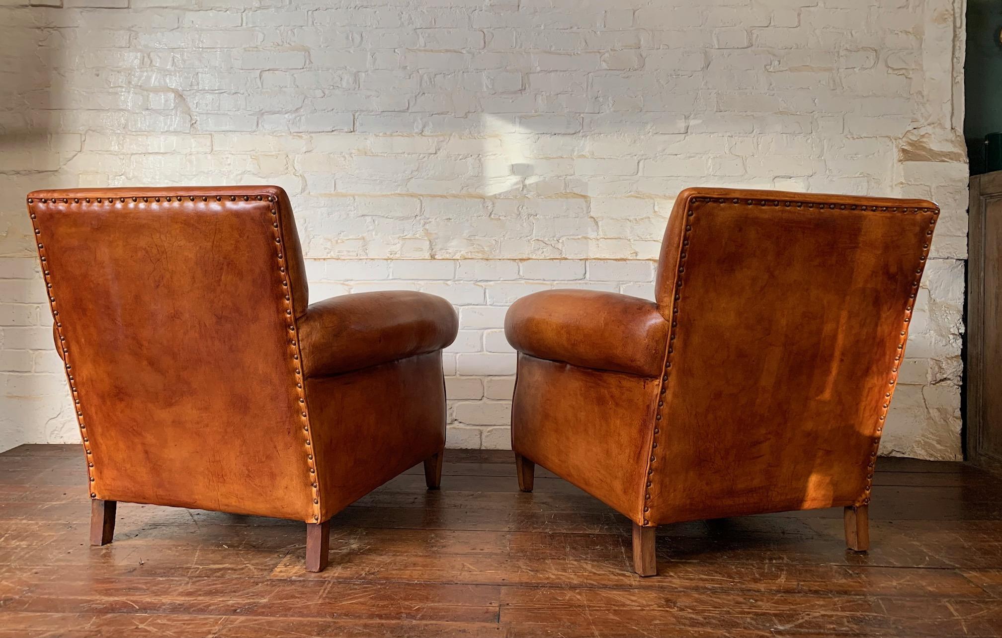 Early 20th Century A Charming Pair of English Leather Club Chairs Circa 1920’s