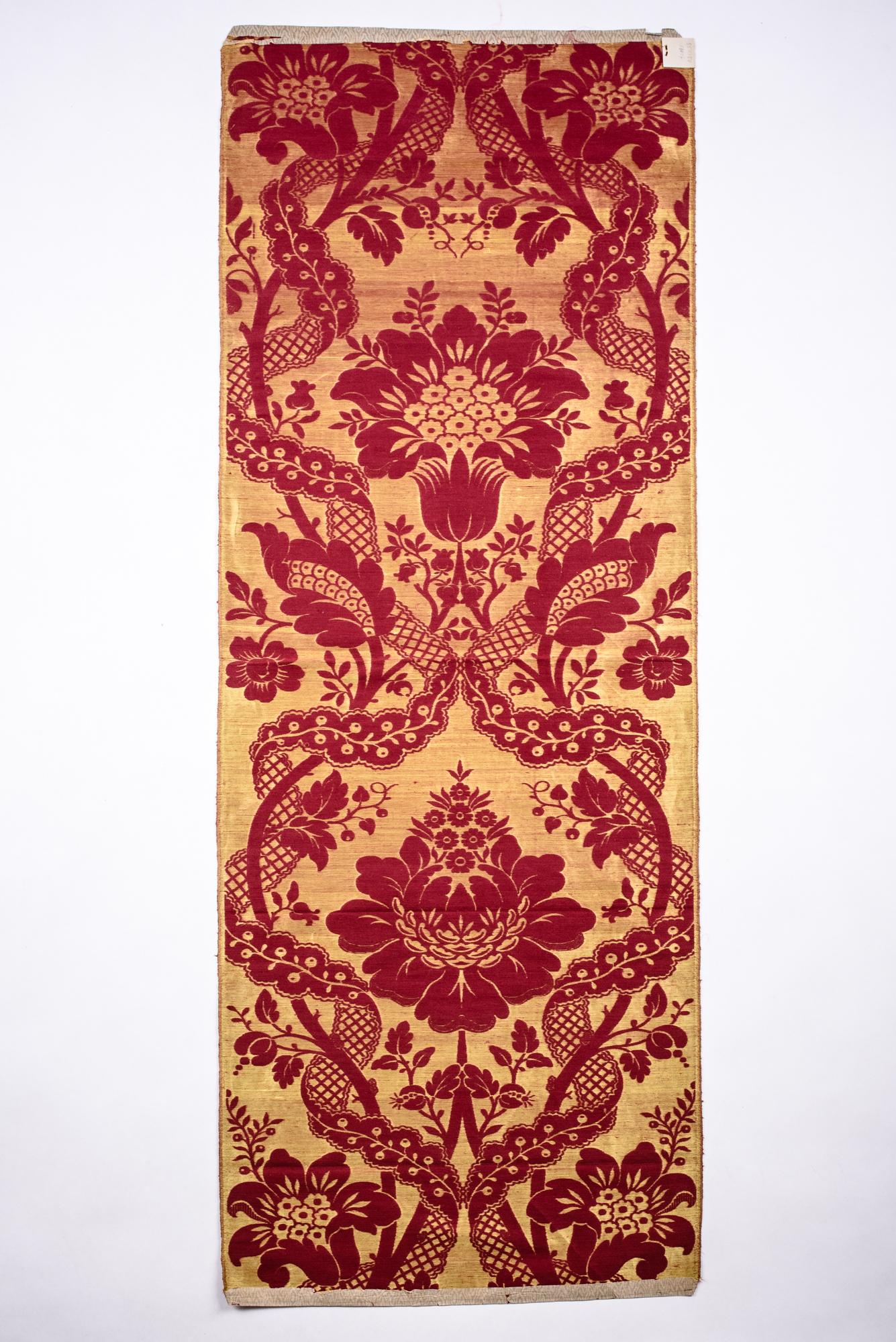 Circa 1870-1880
France

Beautiful silk lampas with a cherry and golden yellow Grand décor decoration in the taste of the designer Arthur Martin. A presentation leaf complete with its selvedges on a cherry satin background and flowers on a golden