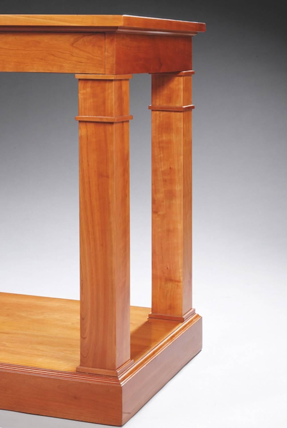 Important cherrywood console attributed to Jean Charles Moreux.