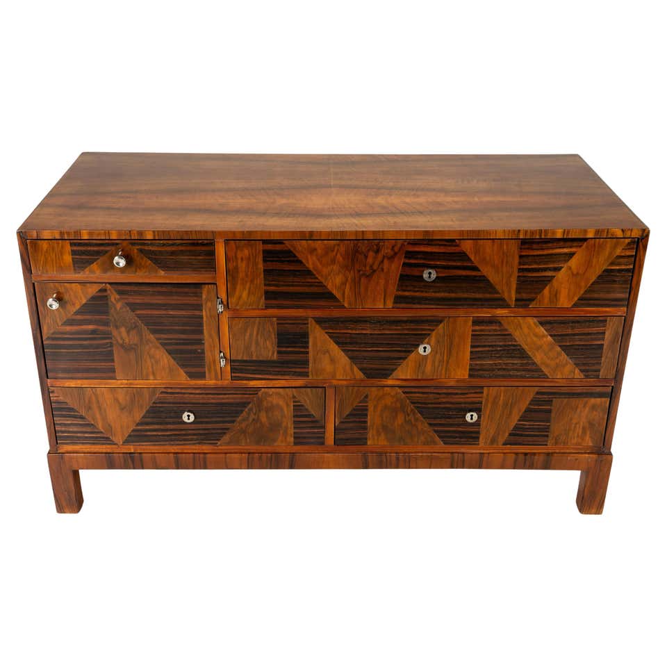 A Pair of Chest of Drawers with Walnut Veneers and Nickel Handles For ...