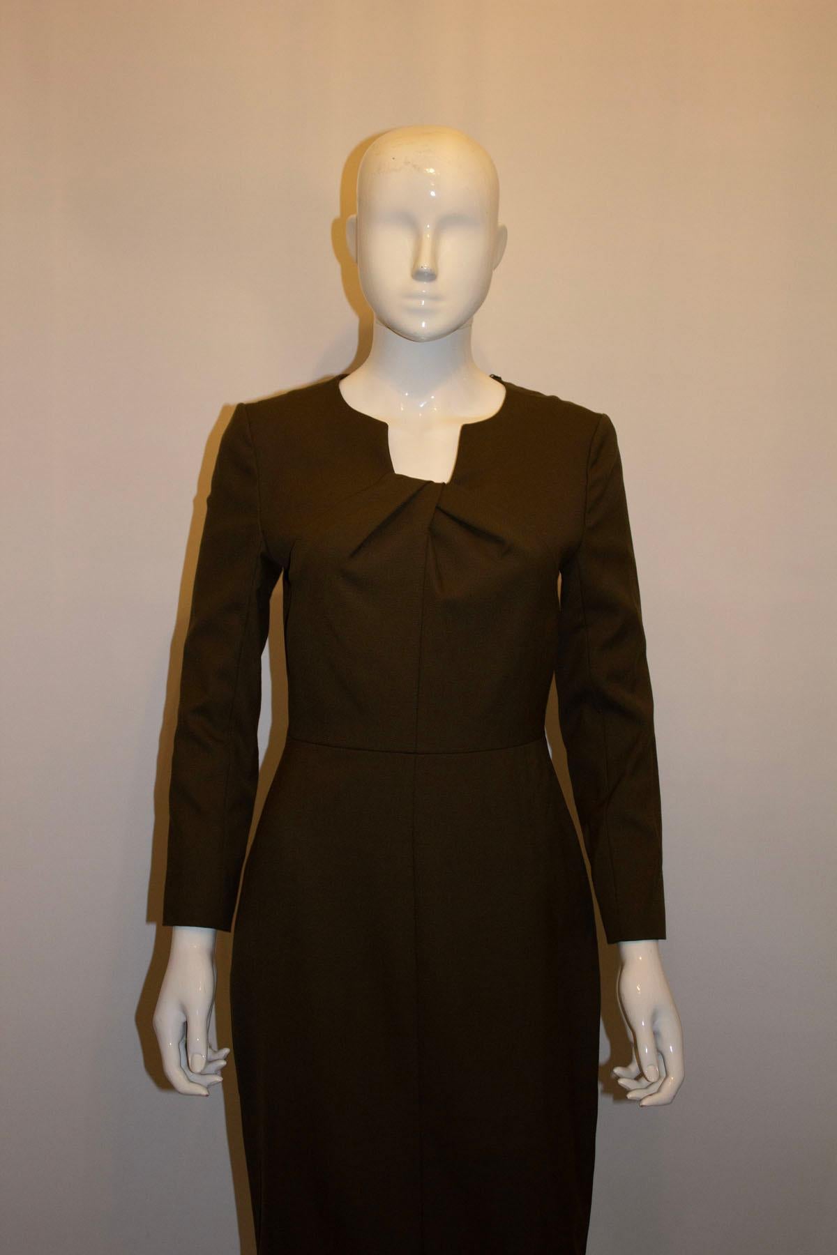 Black A Chic Work to Dinner Dress by The Fold For Sale