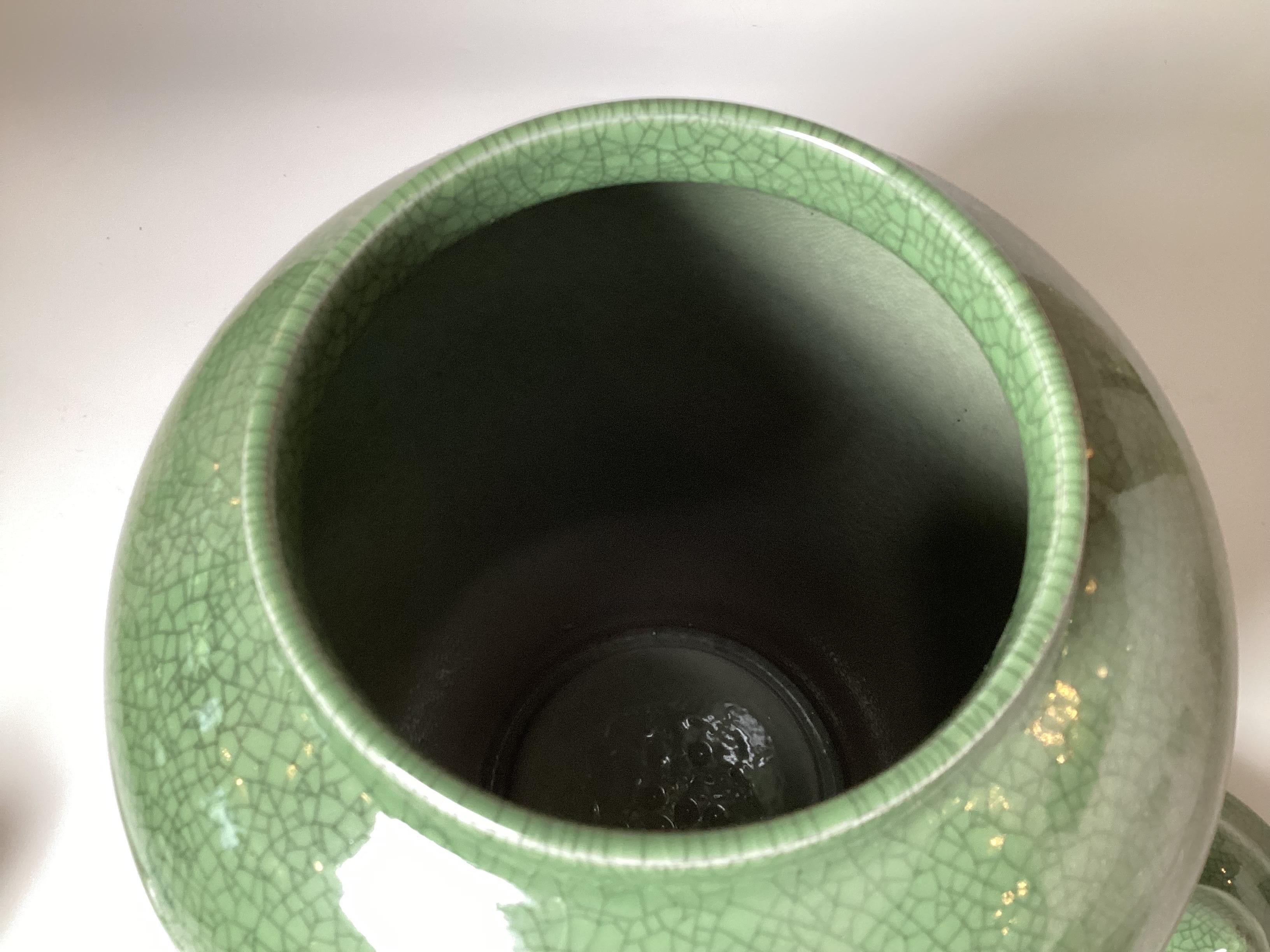 A Chinese Porcelain Temple Jar with Hand Carved Stand  In Excellent Condition For Sale In Lambertville, NJ