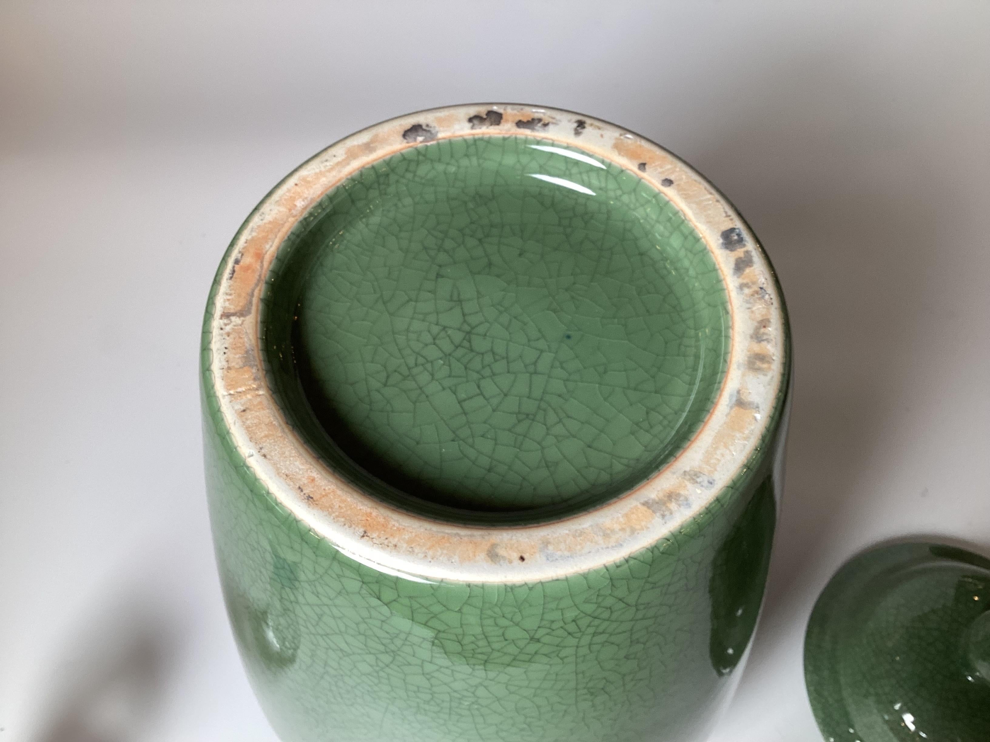 A Chinese Porcelain Temple Jar with Hand Carved Stand In Excellent Condition For Sale In Lambertville, NJ