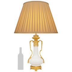 A Chinese Blanc de Chine Porcelain and French 19th century Ormolu mounted lamp