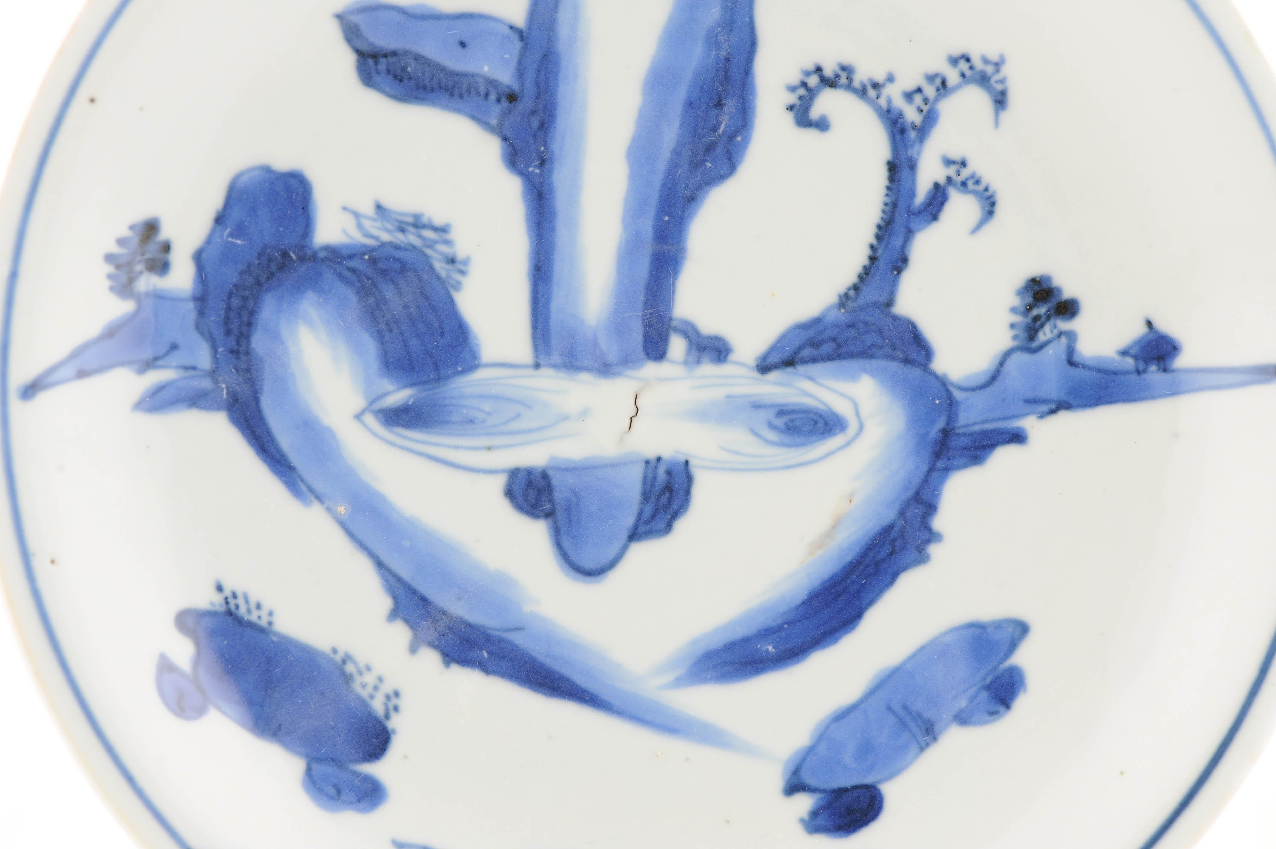 A Chinese blue and white porcelain Dish of beautiful shape and design. With a stunning waterfall scene.
Early 17th century, marked at base.


Condition
kintsugi restored spot at rimand 2 lines. Size: 18.7x2.7CM DiameterxHeight
Period
17th century