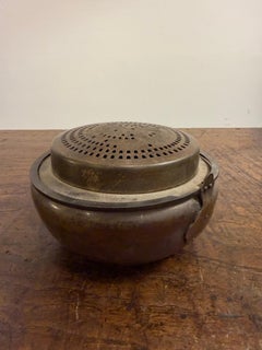 A Chinese Brass Hand Warmer, Early 20th Century