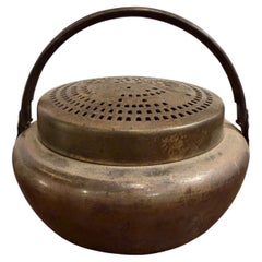 A Chinese Brass Hand Warmer, Early 20th Century