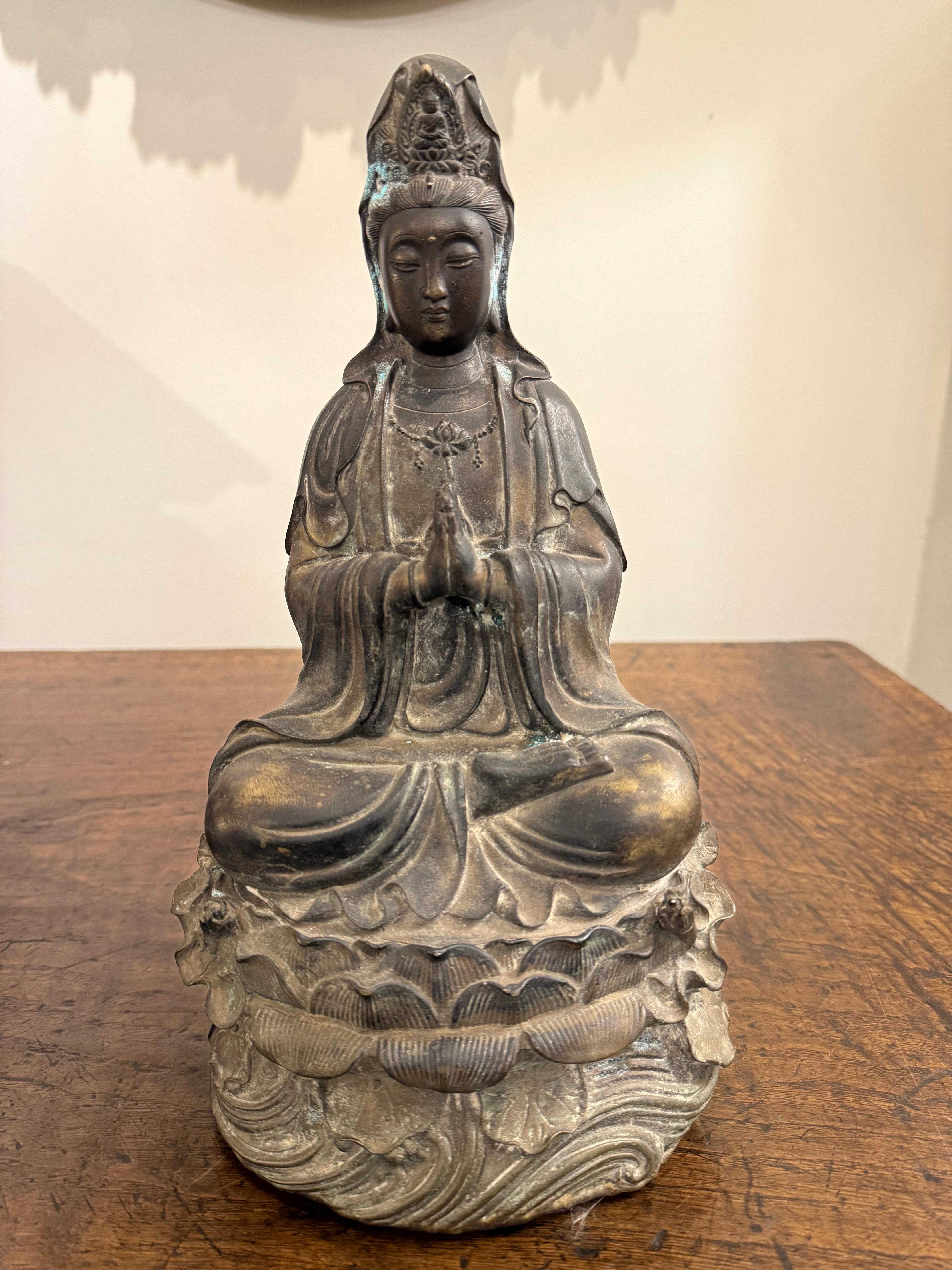 A Chinese Bronze Seated Guanyin, 19th Century

Guanyin is the Buddhist bodhisattva associated with compassion. In the East Asian world, Guanyin is the equivalent term for Avalokitesvara Bodhisattva. Guanyin also refers to the bodhisattva as adopted
