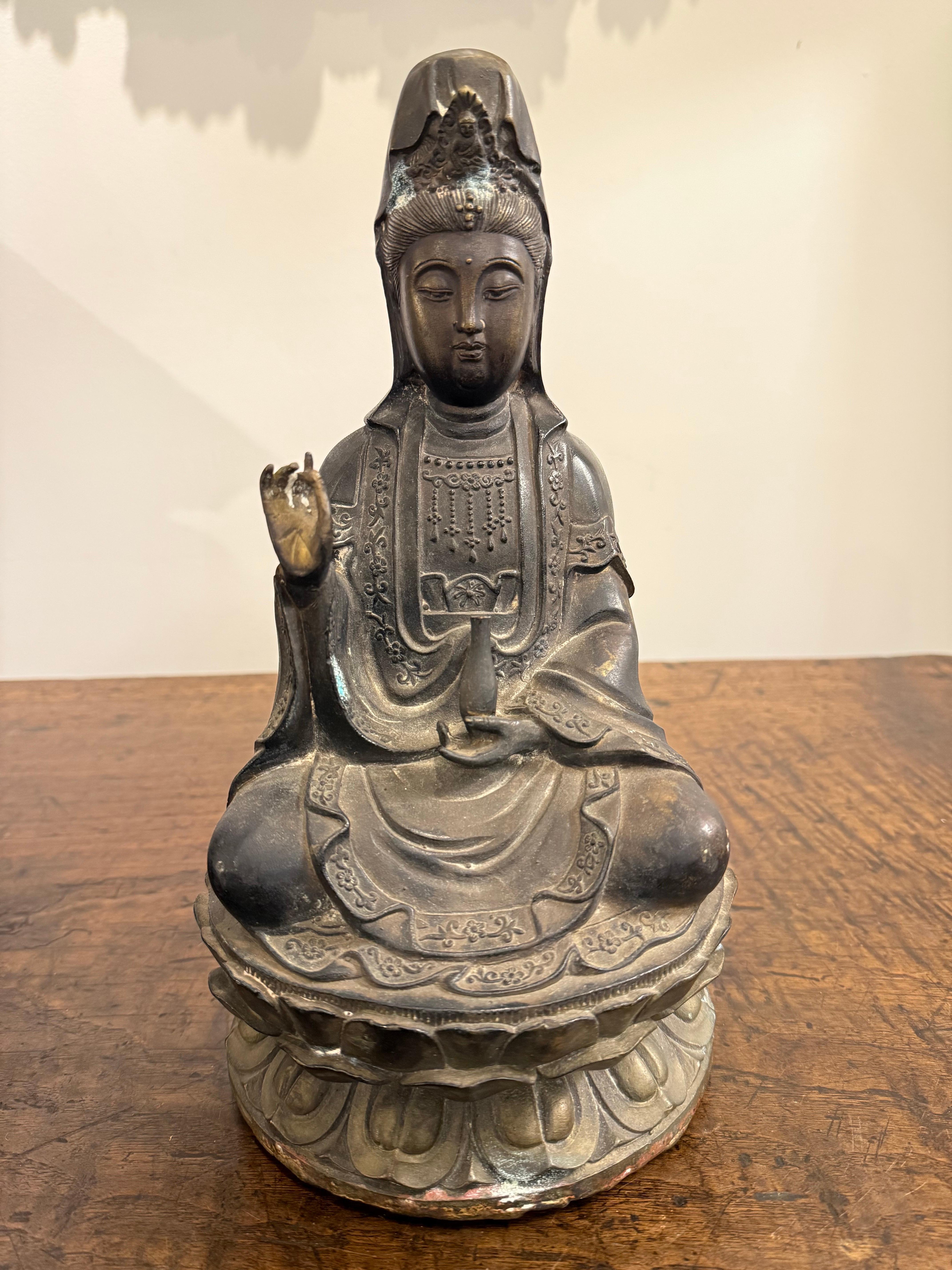A Chinese Bronze Seated Guanyin with Mark, 19th Century

Guanyin is the Buddhist bodhisattva associated with compassion. In the East Asian world, Guanyin is the equivalent term for Avalokitesvara Bodhisattva. Guanyin also refers to the bodhisattva