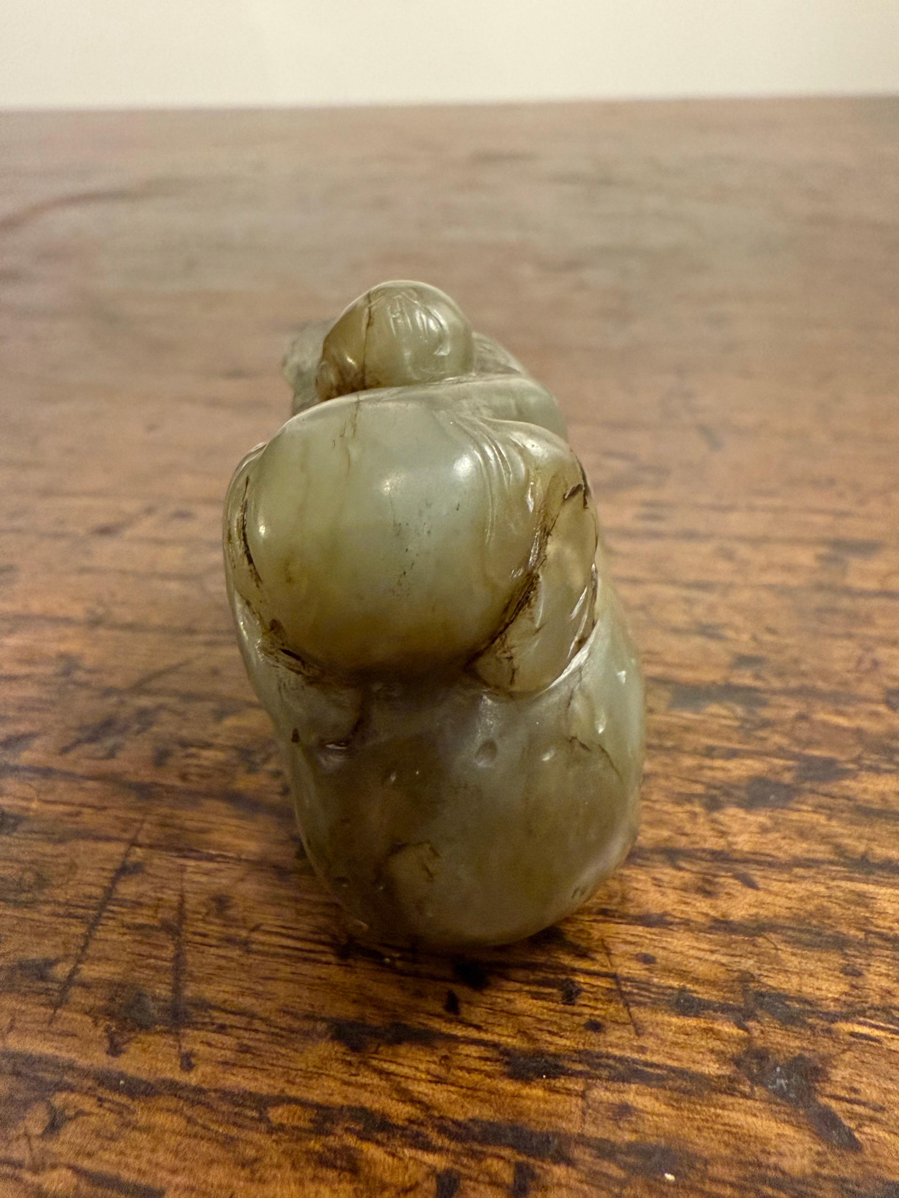 Intagliato a mano A Chinese Carved Celadon Jade of a Boy with a Buffalo, Early 20th Century in vendita