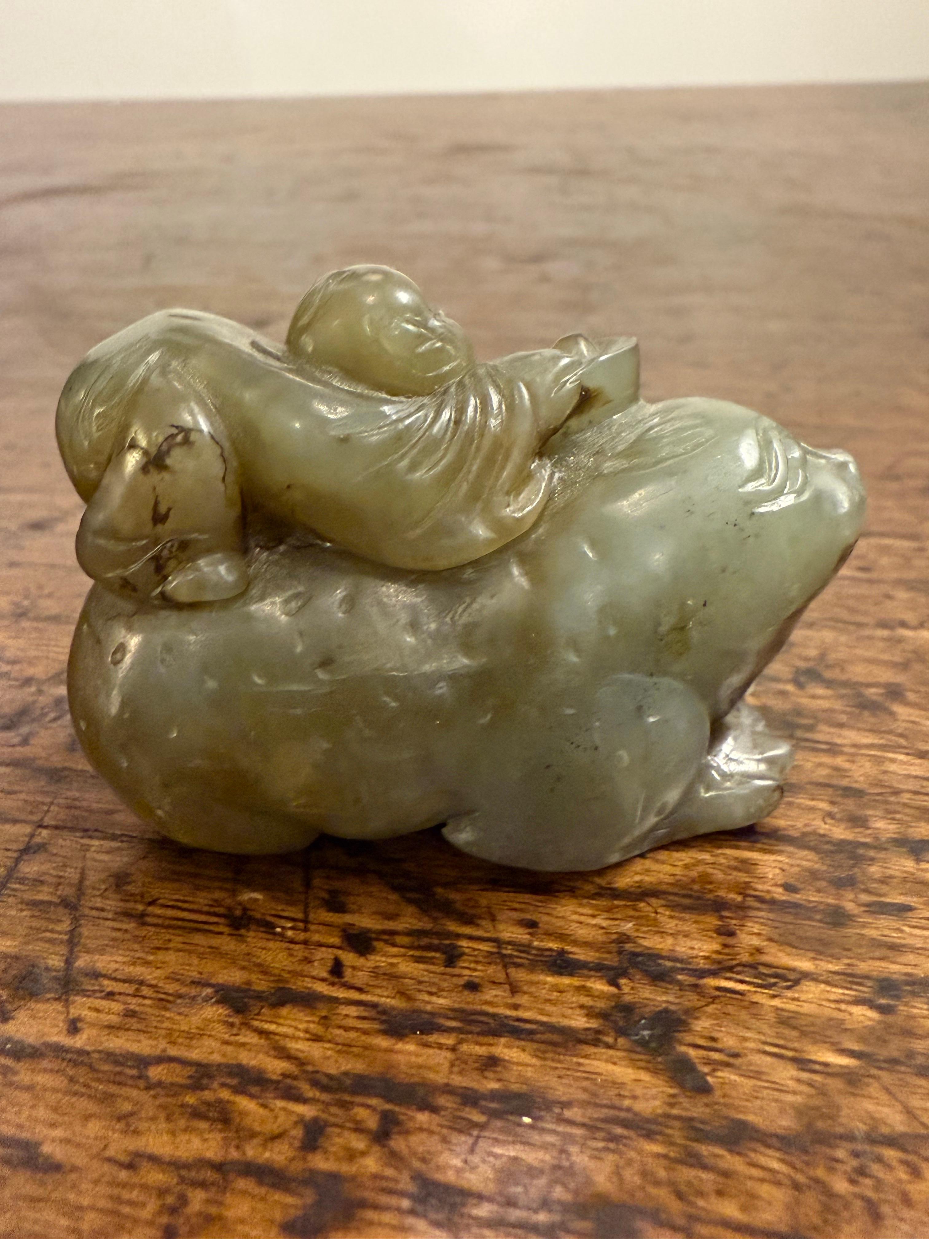 XX secolo A Chinese Carved Celadon Jade of a Boy with a Buffalo, Early 20th Century in vendita