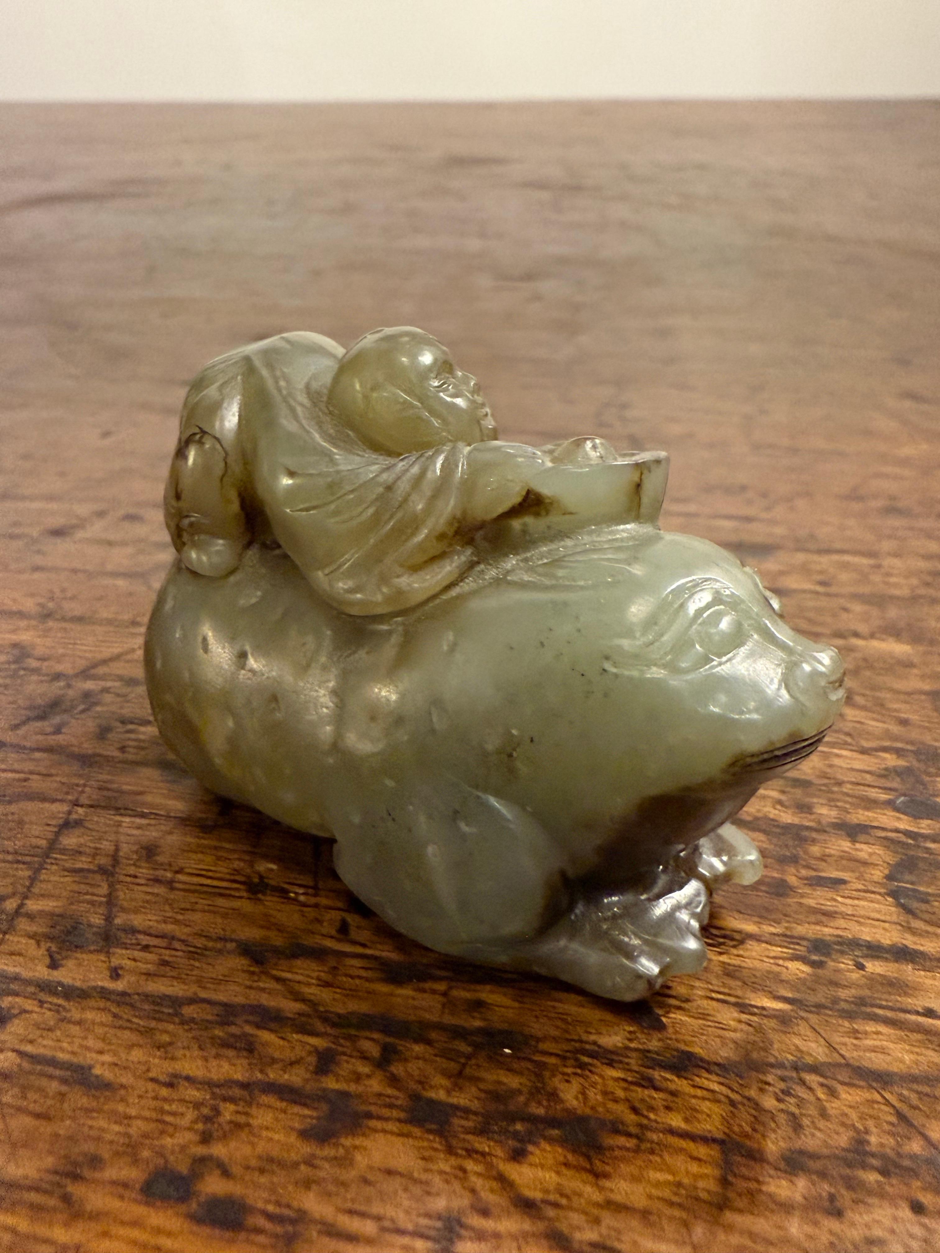A Chinese Carved Celadon Jade of a Boy with a Buffalo, Early 20th Century in vendita 1