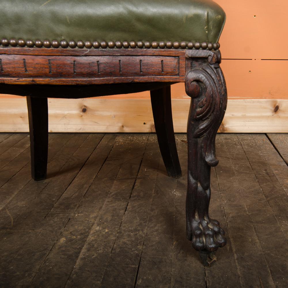 Wood Chinese Carved Dragon Chair with Leather Seat, Nineteenth century. For Sale