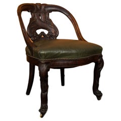 Chinese Carved Dragon Chair with Leather Seat, Nineteenth century. 