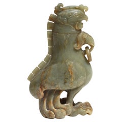 Vase et couvercle Caledon pâle sculpté de Chine