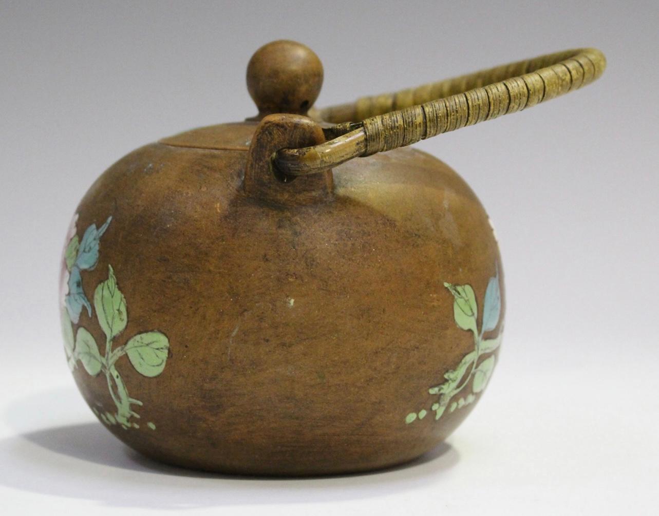 A Chinese Enammeled Yixing Stonewear Teapot and Cover, Qing Dynasty 1