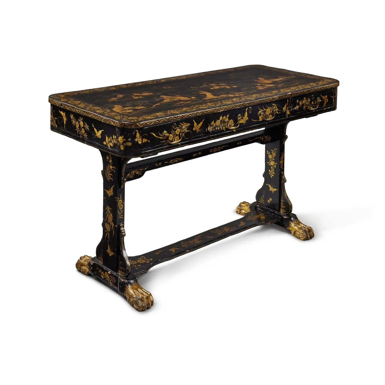 A beautiful Chinese Export black and gold lacquer desk, elaboratly decorated with detailed Chinoiserie scenes, three drawers and beautiful base with stylized paw feet, custom fitted glass top / work surface, China, 19th century

MEASUREMENTS:

31.5